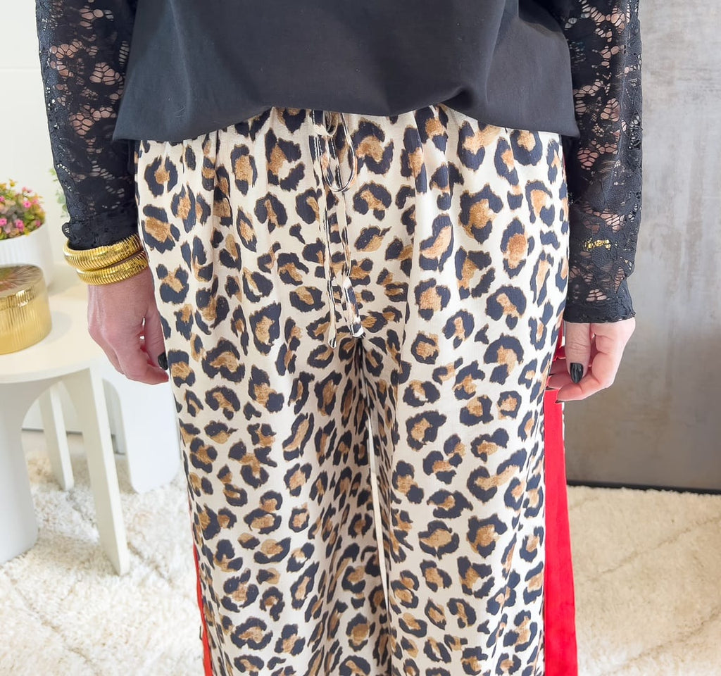 PANTALON LEOPARD JADE BANDE ROUGE