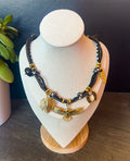 Collier à papilles noir et doré « ADÉLE »