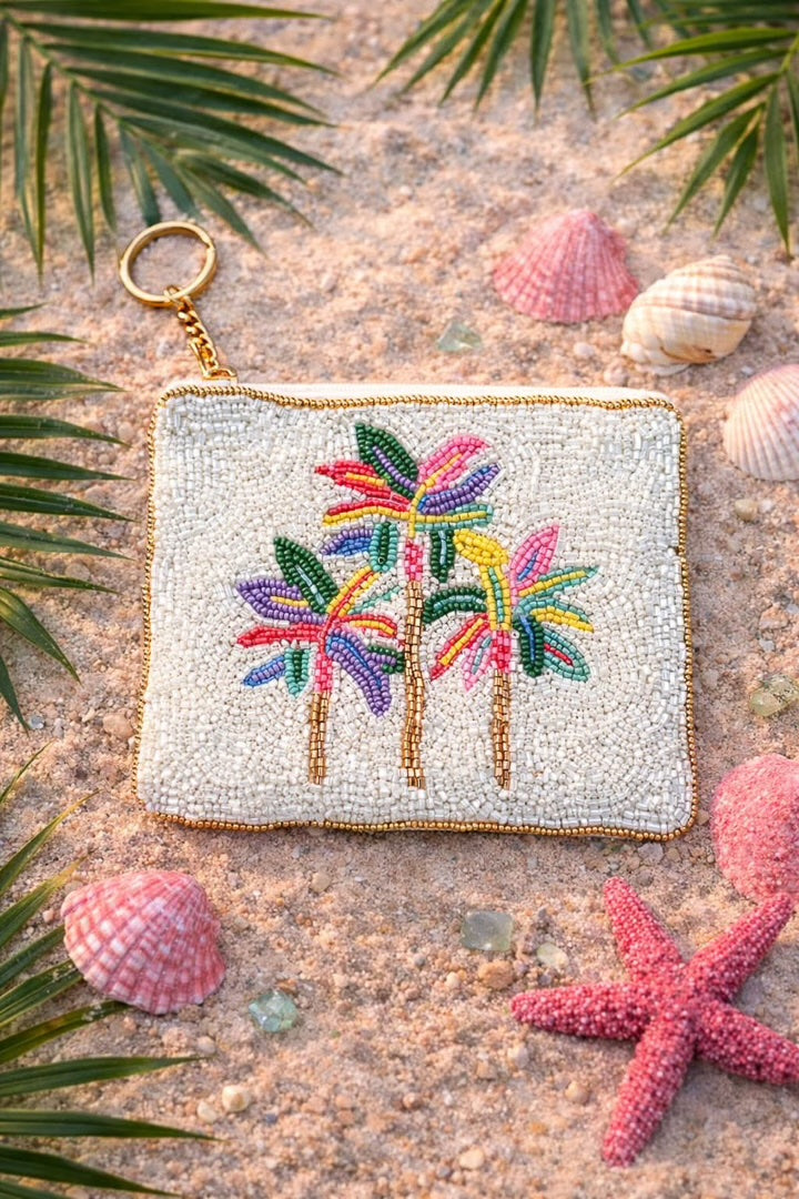 Pochette élégante et féminine avec son jolie motif palmier